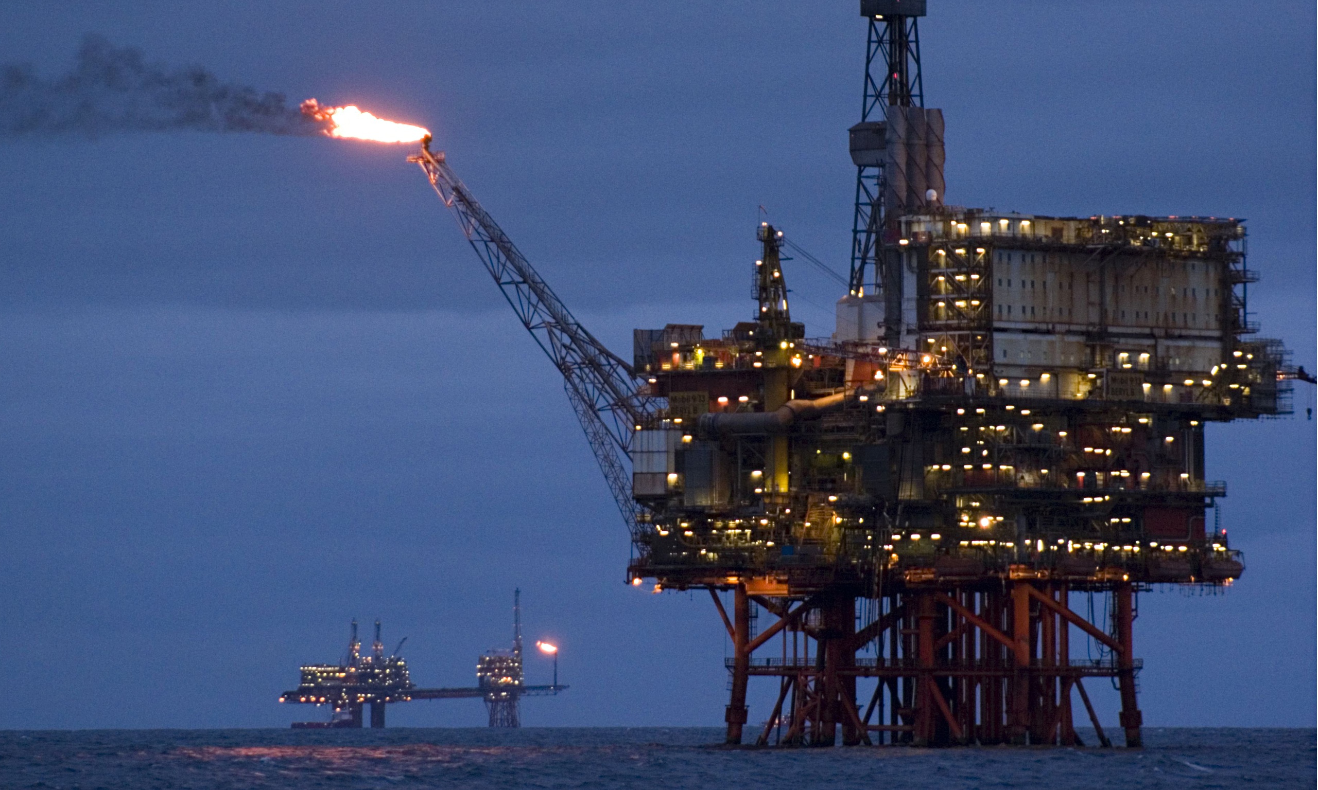 Oil Rises Back Toward $55